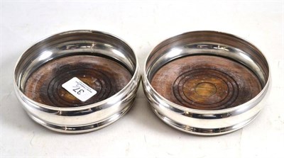 Lot 37 - Pair of silver bottle coasters
