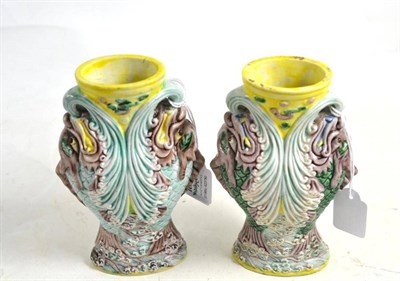 Lot 38 - A matched pair of Chinese porcelain vases, Qianlong reign mark but not of the period, moulded...