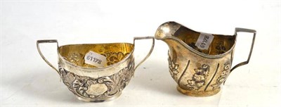 Lot 39 - Silver milk jug and a twin-handled silver sugar bowl (2)