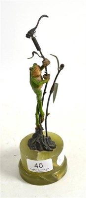 Lot 40 - A cold painted bronze frog climbing up a bullrush toward a dragonfly, on an onyx base, perhaps...