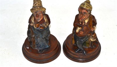 Lot 41 - A pair of 19th century moulded glass figures of Punch & Judy with painted polychrome decoration (2)