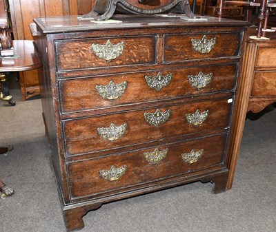 Lot 518 - A George III Oak Chest of Drawers, four height...