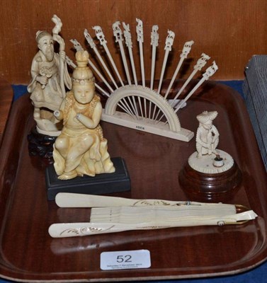 Lot 52 - Two walrus tusk figures, a bone fan, tooth pick holder and a figure of an Indian