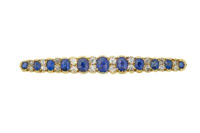 Lot 2333 - A Sapphire and Diamond Brooch eleven graduated...