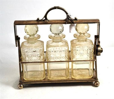 Lot 61 - A James Dixon & Sons electroplated three bottle tantalus