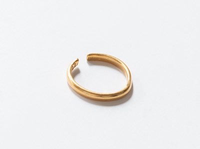 Lot 318 - A 22 Carat Gold Band Ring (a.f.)