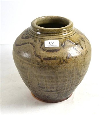 Lot 62 - A stoneware vase by Mike Dodd (b.1943), green ash glaze, incised signature 1981-86, 23.5cm