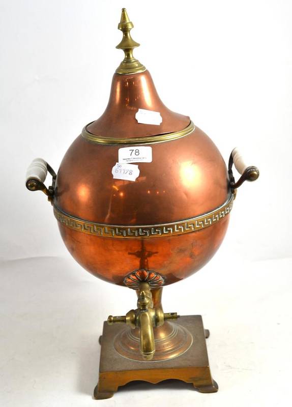 Lot 78 - A copper and brass tea urn