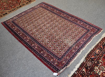 Lot 1098 - Mahal Rug, the raspberry field of angular...
