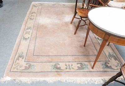 Lot 1271 - Nepalese Carpet, the plain camel field framed...