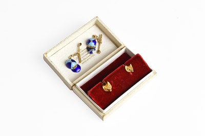 Lot 343 - A Pair of 9 Carat Gold Ruby Fox Mask Dress...