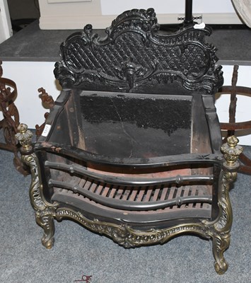 Lot 1317 - A Brass and Iron Fire Basket, in Chippendale...