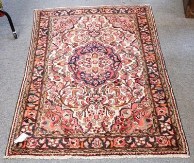 Lot 1276 - Hamadan Rug, the ivory field of meandering...