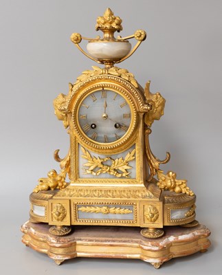 Lot 243 - A French Gilt Metal and Onyx Striking Mantel...