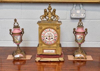 Lot 1307 - A French Gilt Metal and Pink Porcelain Mounted...