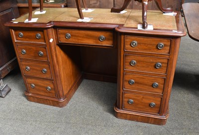 Lot 555 - A Victorian Mahogany Kneehole Desk, with green...