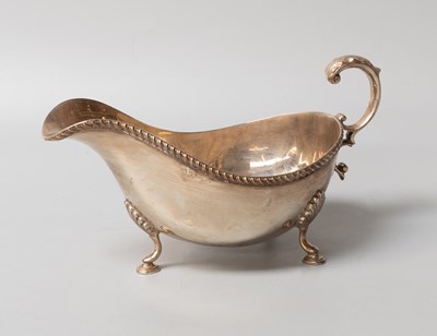 Lot 30 - An Elizabeth II Silver Sauceboat, by Barker...
