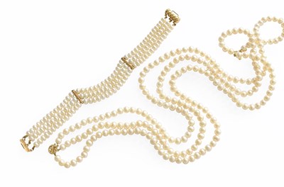 Lot 358 - A Triple Row Cultured Pearl Necklace, with a...