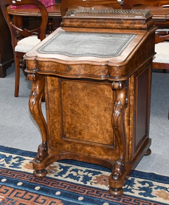 Lot 1225 - A Victorian Figured Walnut Davenport, with...