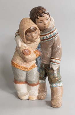Lot 78 - A Large Lladro figure group of Inuits, 40cm high