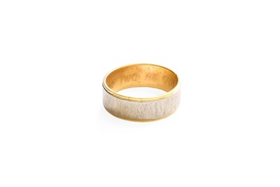 Lot 361 - An 18 Carat Bi-Colour Gold Textured Band Ring,...