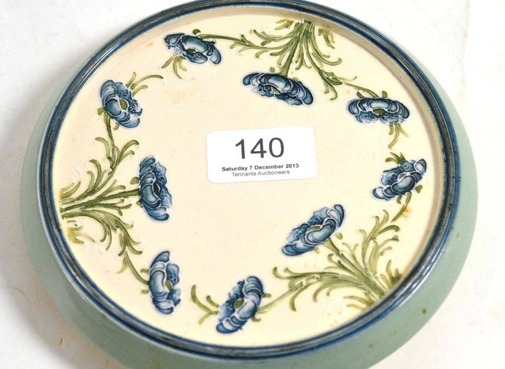 Lot 140 - A Macintyre Moorcroft poppy teapot stand, circa 1905