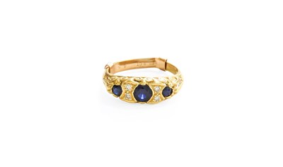 Lot 341 - A Sapphire and Diamond Seven Stone Ring, three...