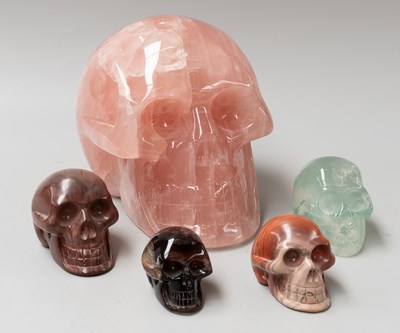 Lot 291 - A Modern Rose Quartz Carved Skull, together...