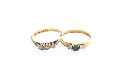 Lot 468 - A Diamond Three Stone Ring, stamped '18CT',...