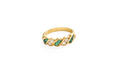 Lot 458 - A Multi-Gem Set Ring, set with alternating...