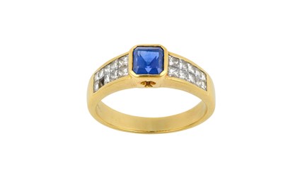Lot 2281 - A Sapphire and Diamond Ring the emerald-cut...