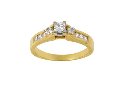 Lot 2214 - An 18 Carat Gold Diamond Ring the central...
