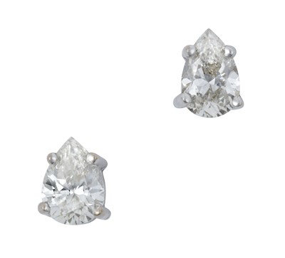 Lot 2306 - A Pair of 18 Carat Gold Diamond Solitaire...