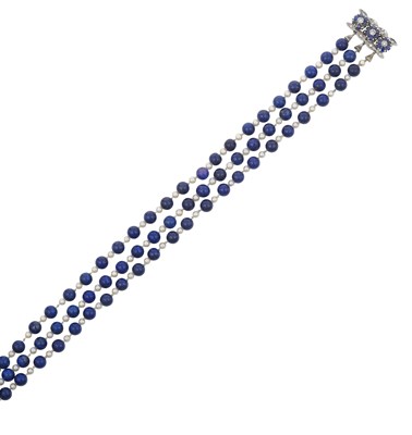 Lot 2280 - A Triple Row Lapis Lazuli and Cultured Pearl...