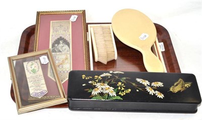 Lot 158 - Art Deco ivory dressing table items, papier mache glove box and two Stevens of Coventry framed...