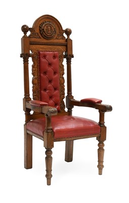 Lot 532 - A Victorian Carved Oak Armchair by Spencer &...