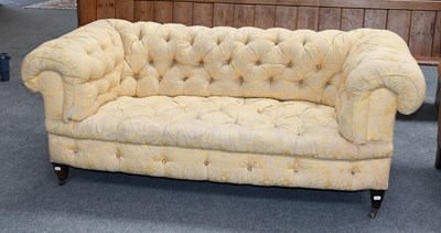 Lot 1222 - An Edwardian Chesterfield Sofa, in buttoned...