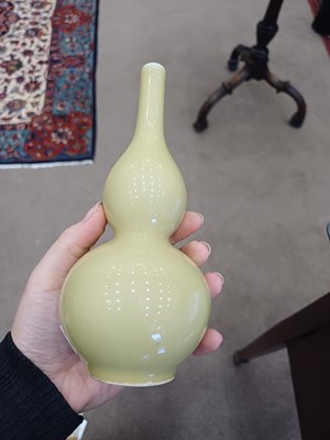 Lot 63 - A Chinese Pale-Yellow-Ground Double Gourd Vase,...