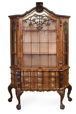 Lot 569 - An Early 20th Century Carved and Figured Burr...