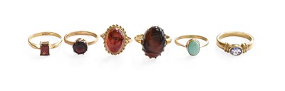 Lot 473 - Six 9 Carat Gold Multi-Gem Set Rings,...