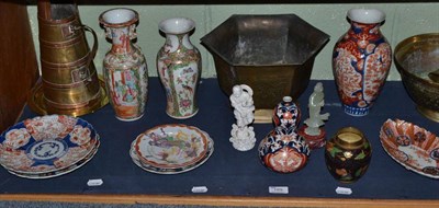 Lot 189 - A shelf of Oriental brass and copper, Cantonese vases, Imari etc