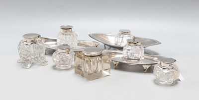 Lot 100 - A Collection of Seven Silver-Mounted Glass...