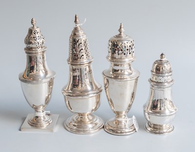 Lot 81 - Four Various Silver Casters, each on spreading...
