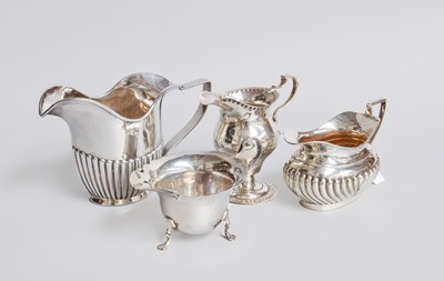 Lot 58 - Four Assorted Silver Cream-Jugs, variously...