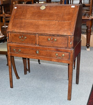 Lot 1279 - An 18th Century Oak Bureau on Stand, with...