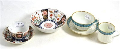 Lot 210 - A first period Worcester porcelain fluted tea bowl and saucer, circa 1770, painted with the...