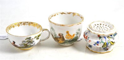 Lot 214 - A Furstenberg porcelain coffee cup, circa 1770, painted with chickens in landscape, painted mark in