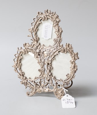 Lot 57 - A Victorian Silver Triple Photograph-Frame, by...