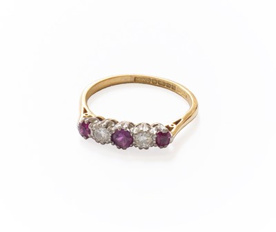 Lot 221 - An 18 Carat Gold Ruby and Diamond Five Stone...