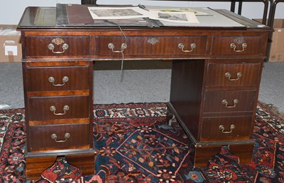 Lot 1312 - A Reproduction Mahogany Leather Inset Twin...